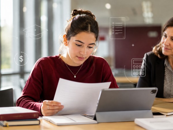Professional studying documents in preparation for certification